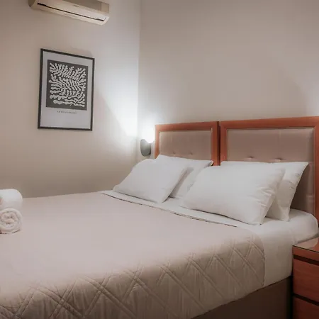 Hermes Rooms & Suites מלון דירות Olympiakí Aktí